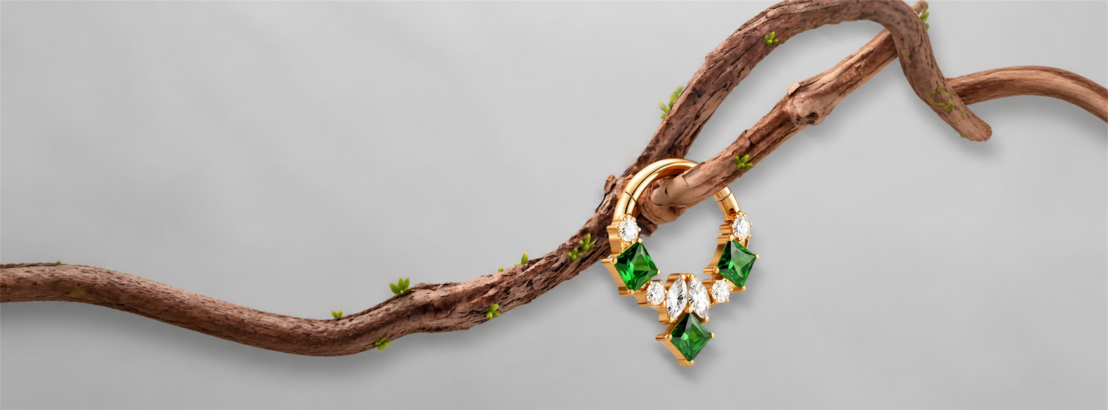 18K gold and diamond body jewelry shown in close detail